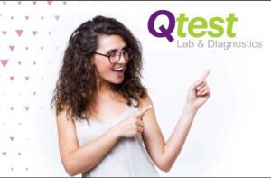 Qtest Lab and Diagnostics - Girl pointing to Logo