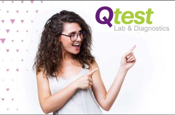 Qtest Lab and Diagnostics - Girl pointing to Logo