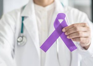 Qtest Lab and Diagnostics - Purple Ribbon for Cancer Awareness Stock Image