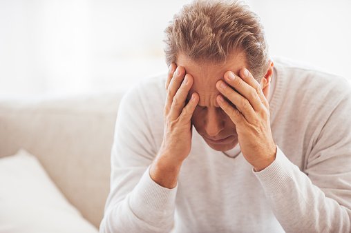 Qtest Lab and Diagnostics - Depressed mature man